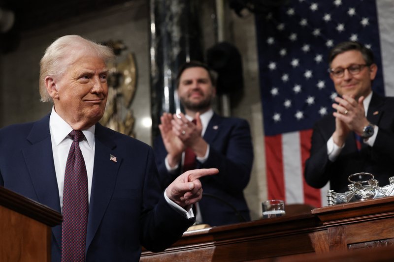 WASHINGTON, DC - MARCH 04: U.S. President Donald Trump addresses a joint session of Congress at the U.S. Capitol on March 04, 2025 in Washington, DC. Vice President JD Vance and Speaker of the House Mike Johnson (R-LA) applaud behind him. President Trump was expected to address Congress on his early achievements of his presidency and his upcoming legislative agenda. Win McNamee/Getty Images/AFP (Photo by WIN MCNAMEE / GETTY IMAGES NORTH AMERICA / Getty Images via AFP)